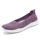 Breathable Flyknit shoes with soft soles, slip-on design.